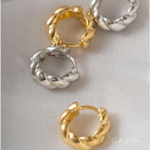 BRINCO ARGOLA TORCIDA EM BANHO DE OURO 18K