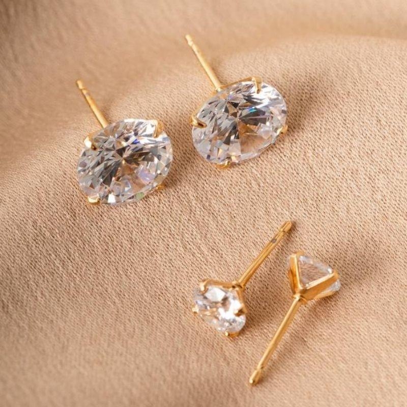 BRINCO PONTO DE LUZ - M EM BANHO DE OURO 18K