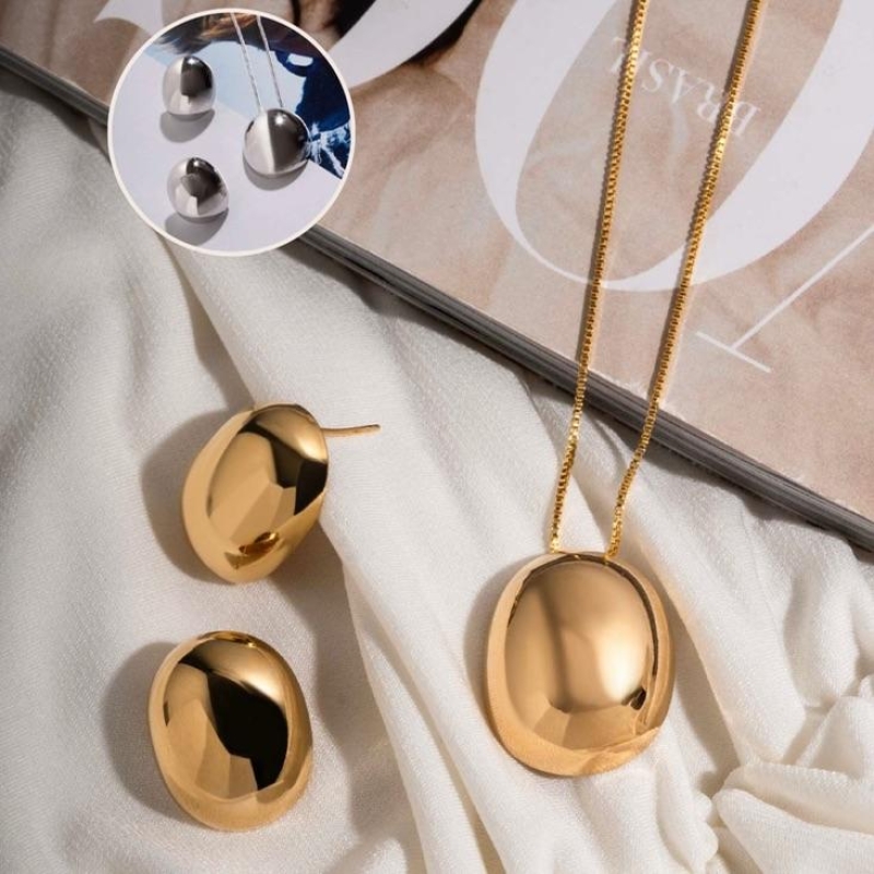 CONJUNTO OVAL LISO EM BANHO DE OURO 18K