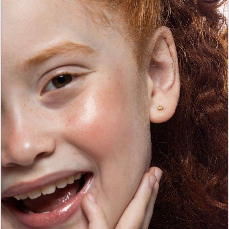 BRINCO PONTO DE LUZ CRISTAL EM BANHO DE OURO 18K