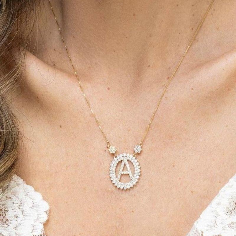 COLAR LETRA D CRAVEJADO MICRO ZIRCÔNIA EM BANHO DE OURO 18K