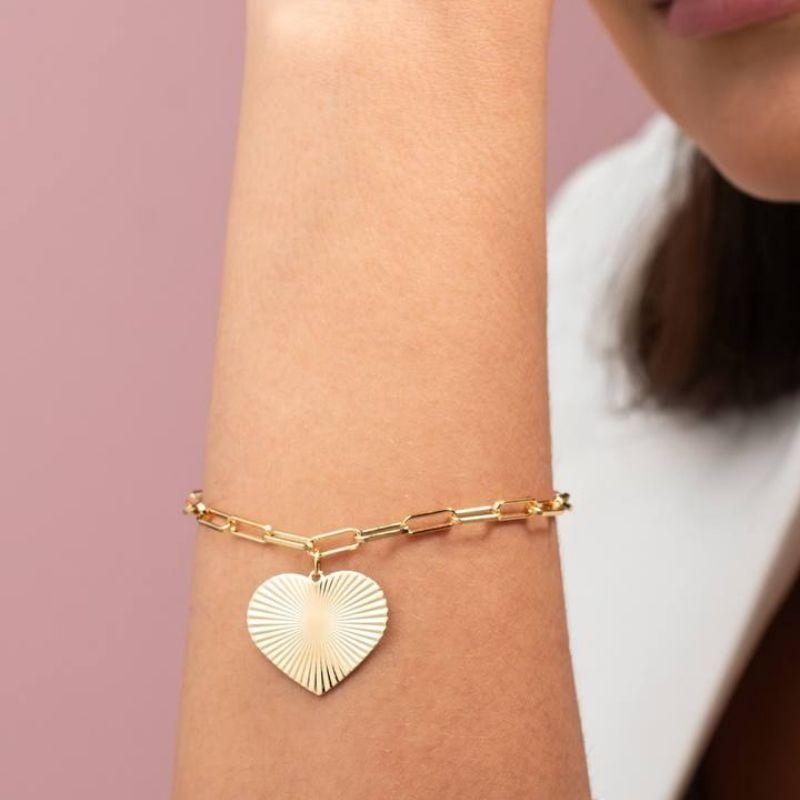 PULSEIRA CARTIER CORAÇÃO DETALHADO EM BANHO DE OURO 18K