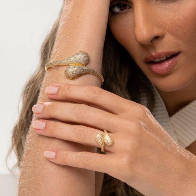 ANEL TRANSPASSADOS GOTAS CRAVEJADAS EM BANHO DE OURO 18K