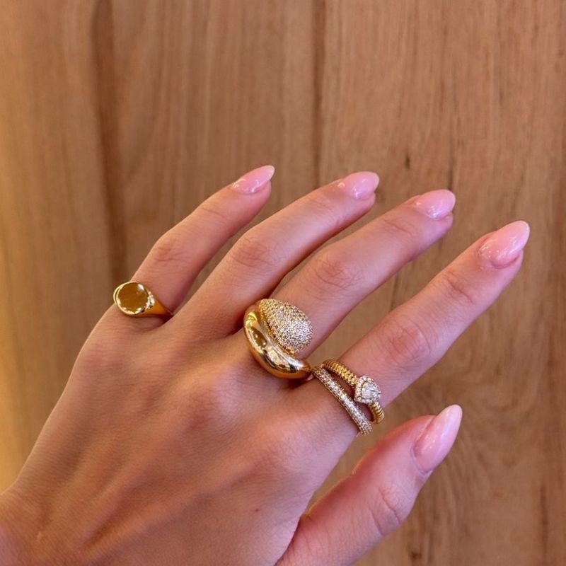 ANEL LUXO GOTA CRAVEJADA E ARCO DE PROTEÇÃO GOLD EM BANHO DE OURO 18K