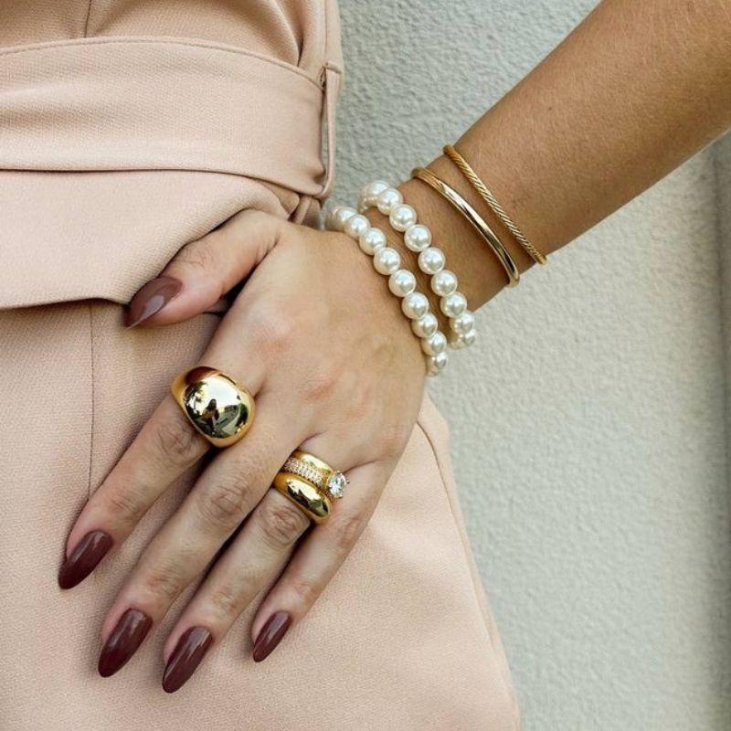 ANEL ABAULADO LARGO EM BANHO DE OURO 18K