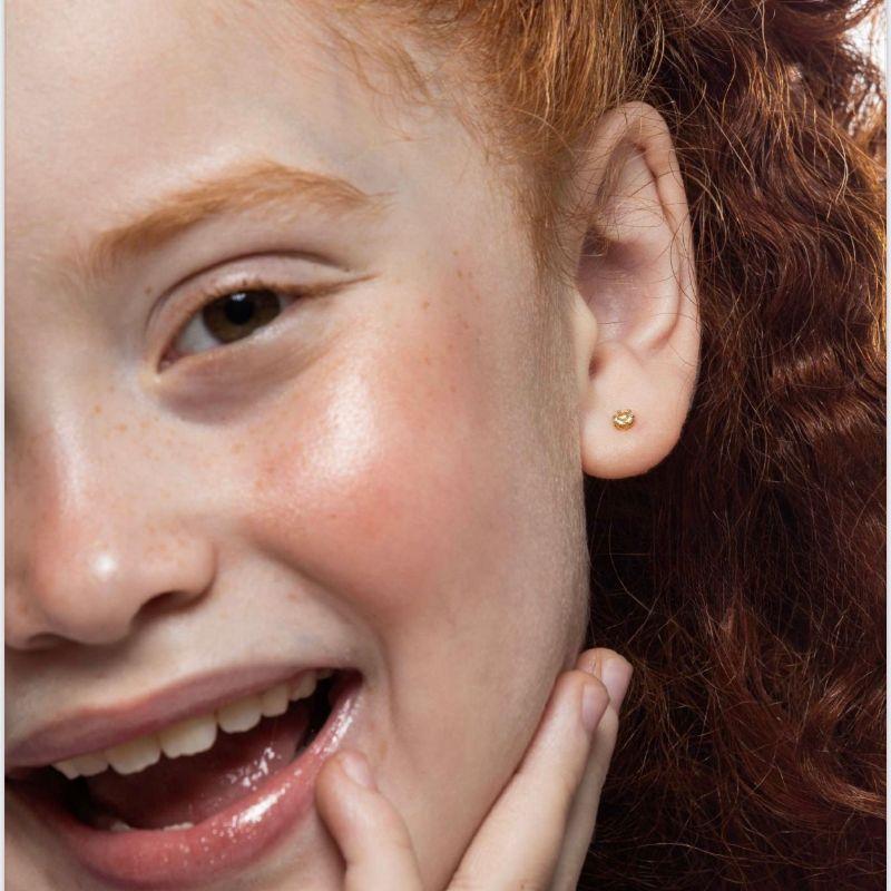 BRINCO PONTO DE LUZ CRISTAL EM BANHO DE OURO 18K