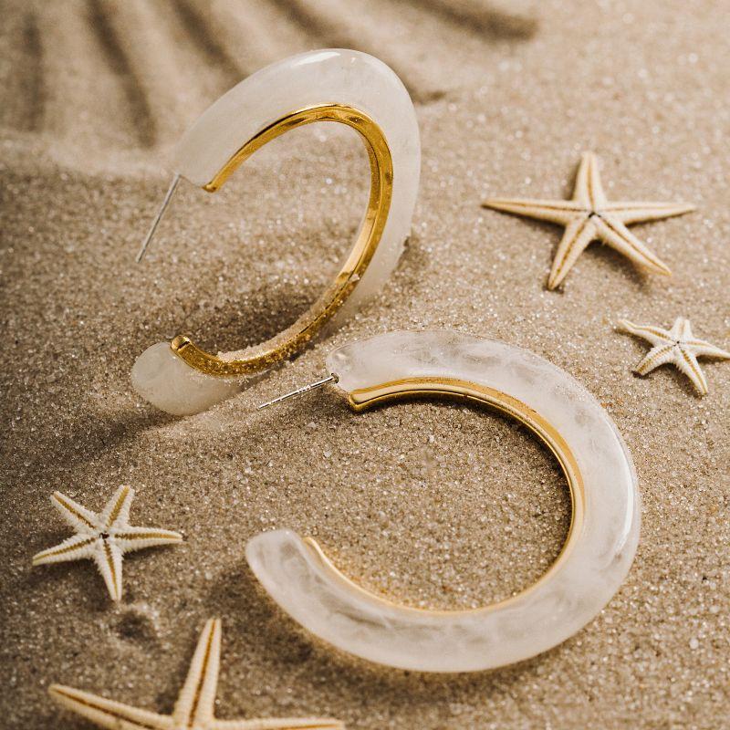 BRINCO ARGOLA LISA EM BANHO DE OURO 18K