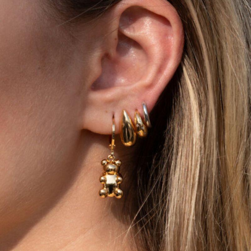 BRINCO ARGOLA URSO LISO EM BANHO DE OURO 18K