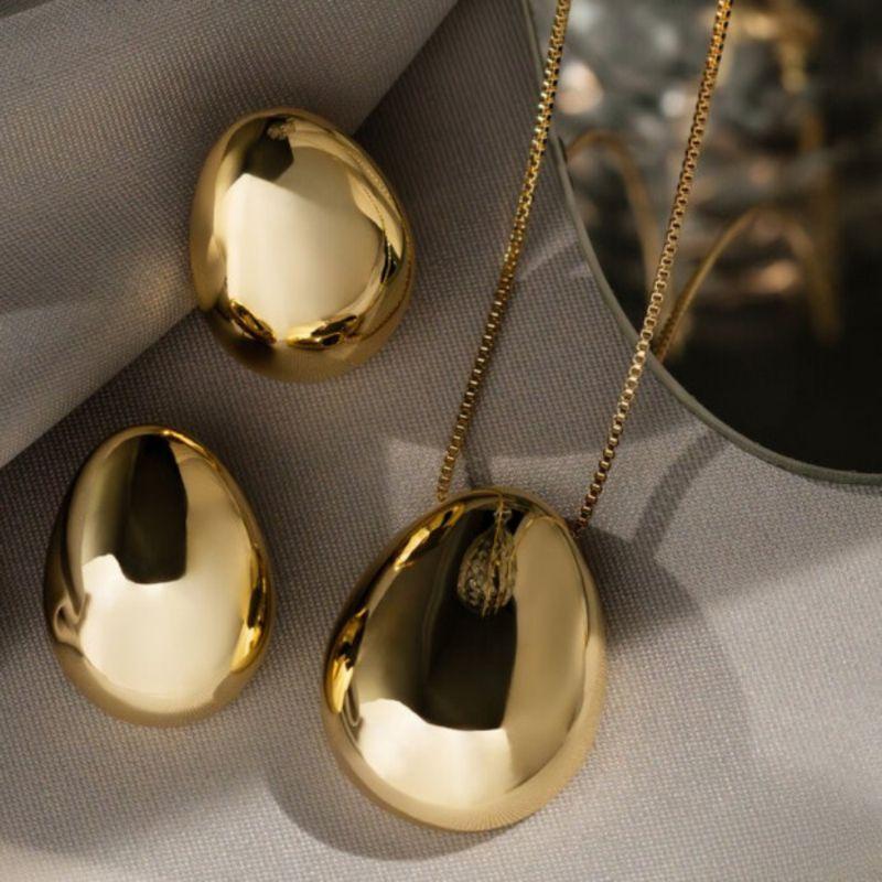 CONJUNTO OVAL LISO EM BANHO DE OURO 18K