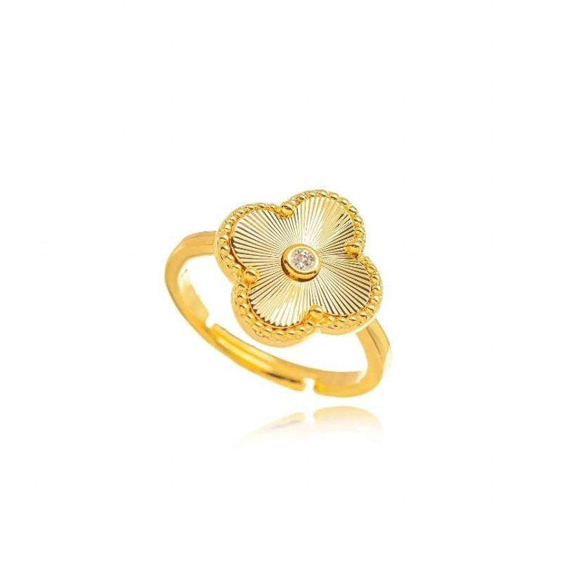 ANEL REGULÁVEL TREVO CRAVEJADO COM ZIRCÔNIA CENTRAL EM BANHO DE OURO 18K