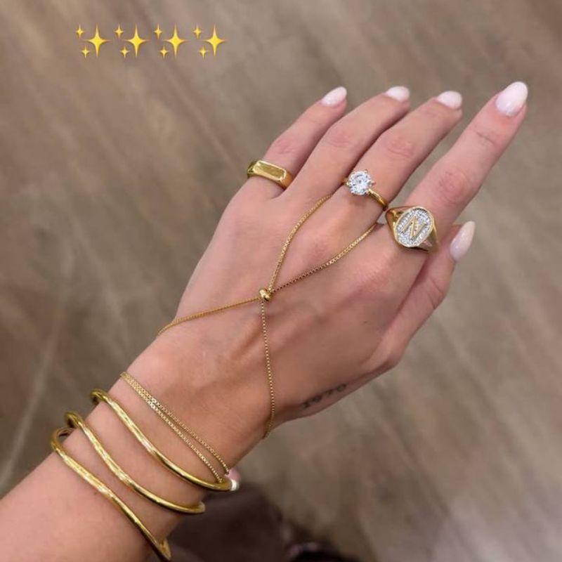 ANEL SOLITÁRIO EM BANHO DE OURO 18K COM CRISTAL BRILHANTE