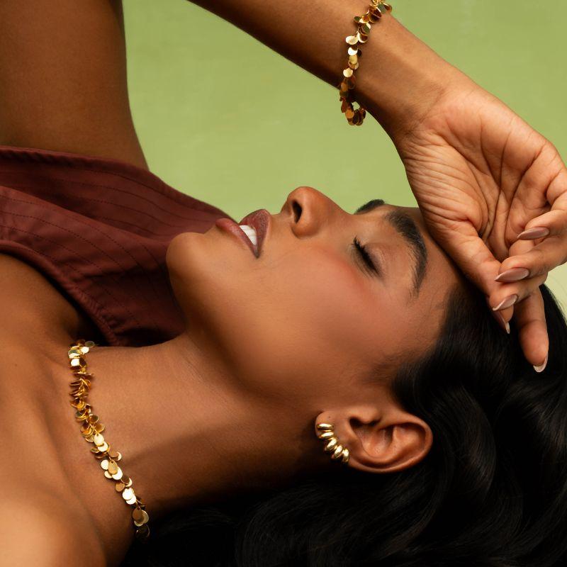 BRINCO EAR CUFF GRÃOS ANATÔMICOS - BANHO DE OURO 18K