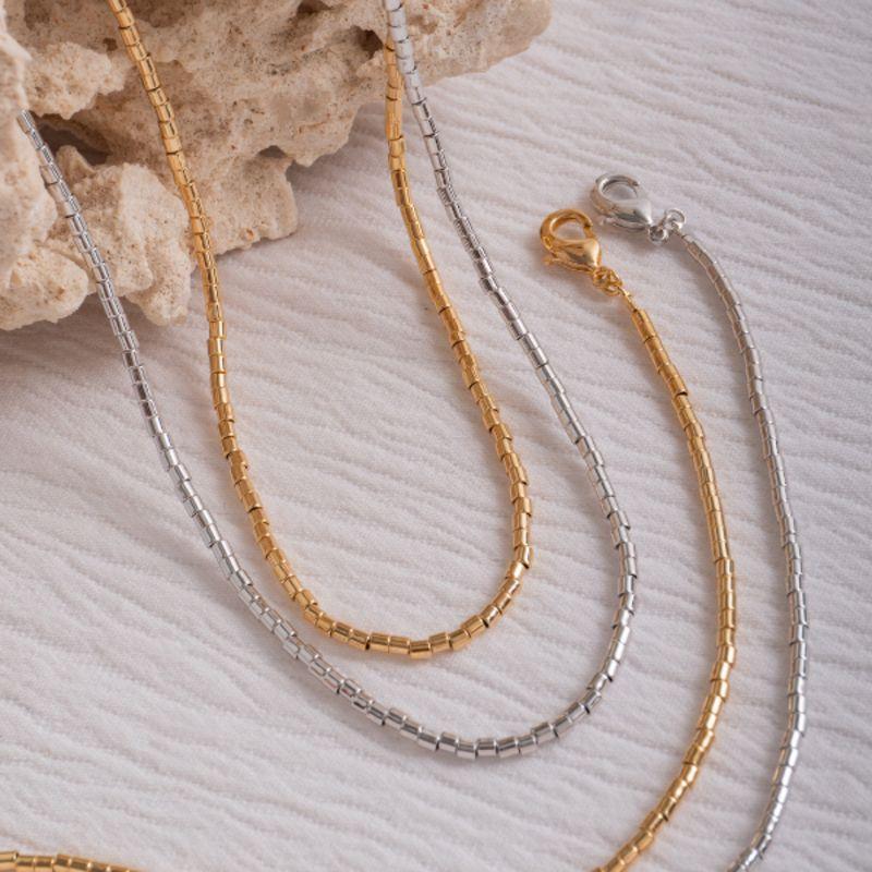 COLAR CHOKER TUBINHO ARTICULADO EM BANHO DE RÓDIO BRANCO