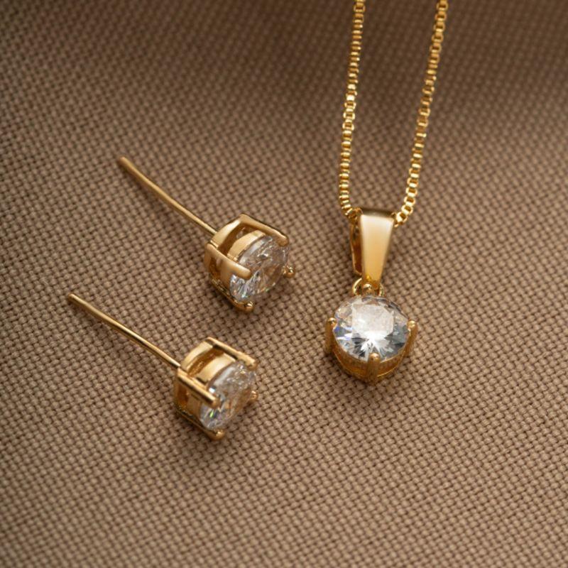 CONJUNTO COLAR E BRINCOS PONTO DE LUZ CRISTAL EM BANHO DE OURO18K