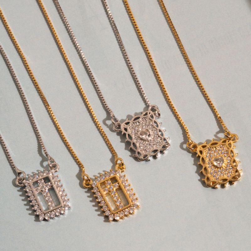 ESCAPULÁRIO NOSSA SENHORA APARECIDA E SAGRADO CORAÇÃO CRAVEJADO EM BANHO DE OURO 18K