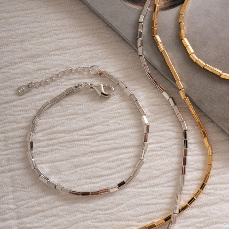 PULSEIRA MALHA DE CANUTILHOS METÁLICOS - BANHO DE RÓDIO BRANCO