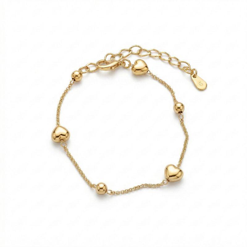 PULSEIRA DE ELOS COM CORAÇÕES E ESFERAS BANHADA EM OURO 18K